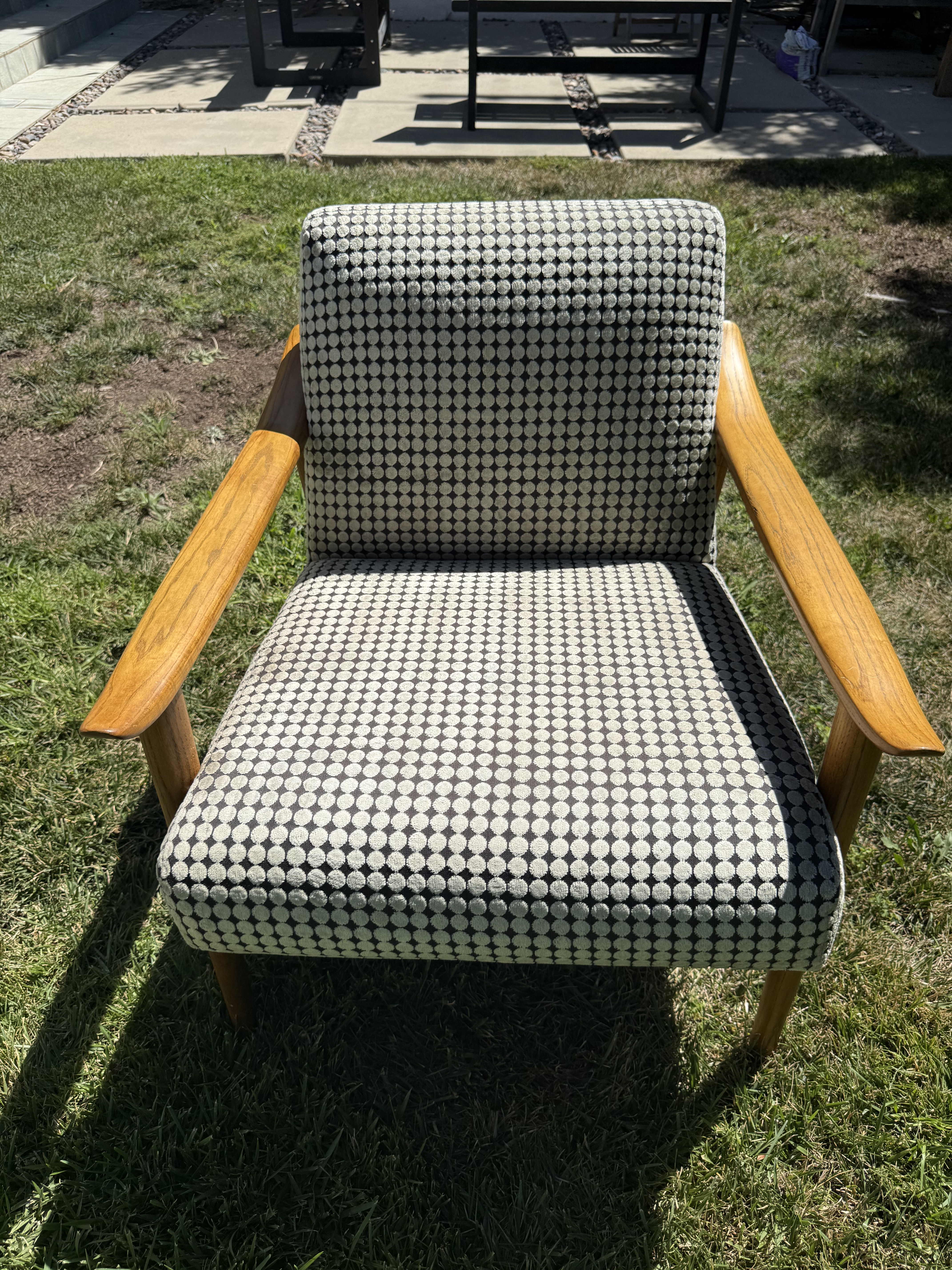 Patterned armchair after Avelo upholstery treatment